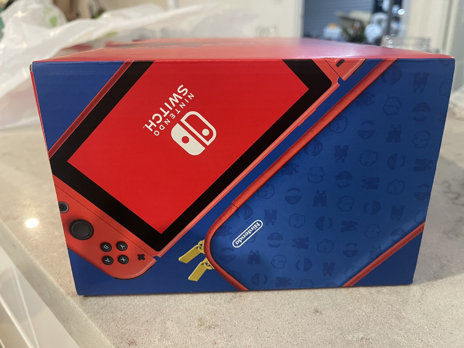Nintendo Switch (Mario Red & Blue Edition)